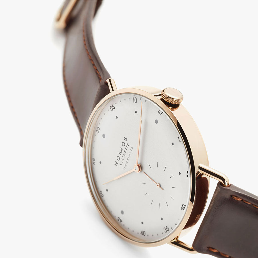 Nomos metro rose discount gold